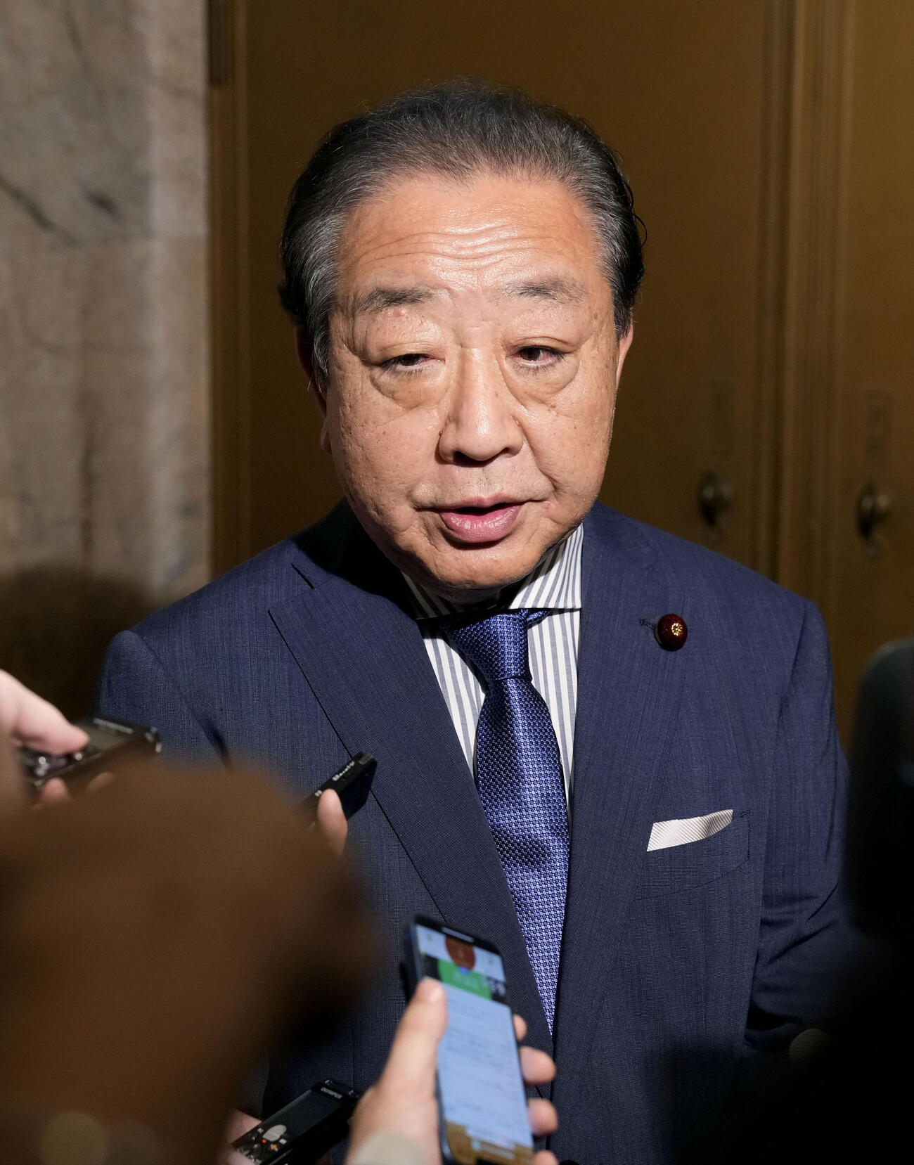 衆院本会議後、記者団の取材に応じる中道改革連合の野田元首相（共同）