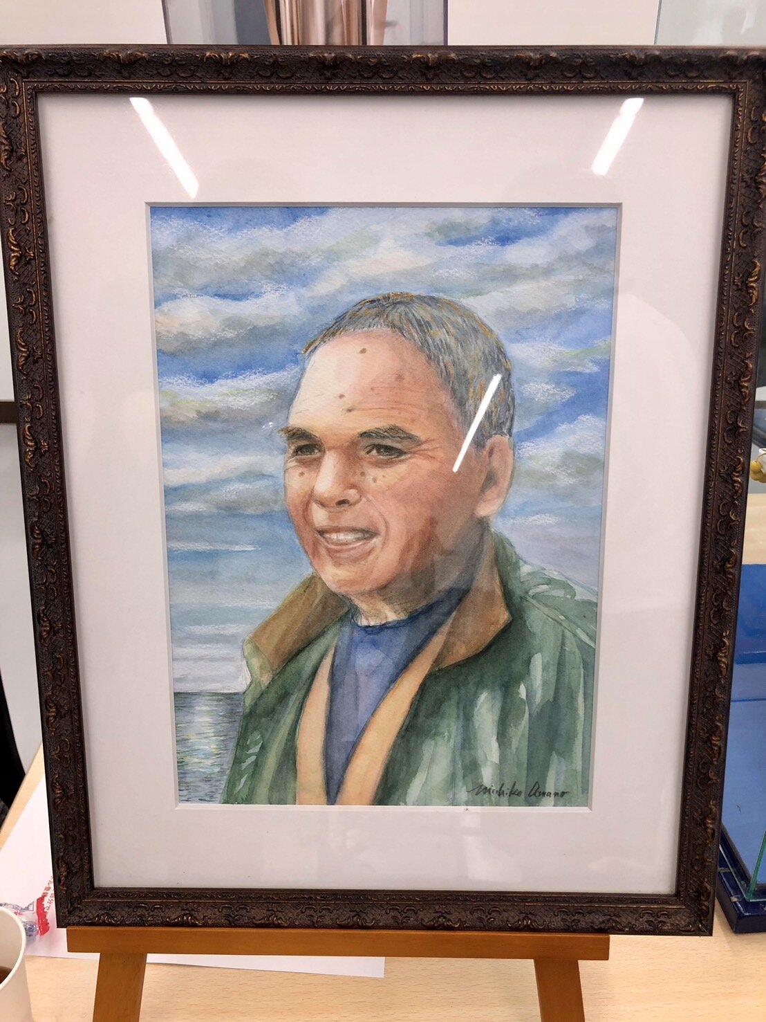 「菅原進船長をしのぶ会」で展示された菅原船長の肖像画