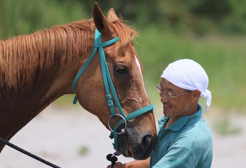 生前のドリームシグナルと角居勝彦氏（正木徹さん撮影、角居氏提供）