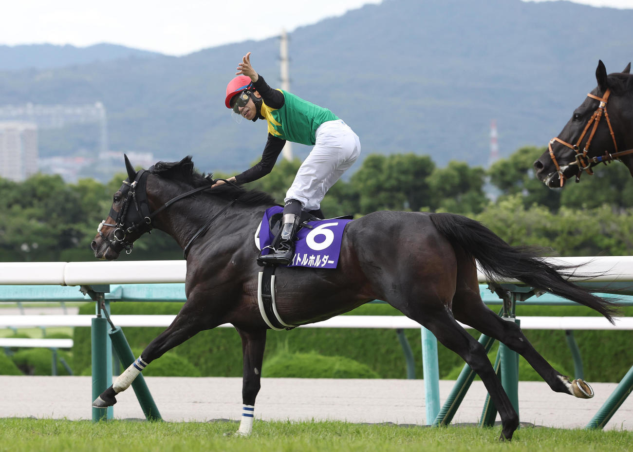 6月26日、宝塚記念を制したタイトルホルダーと横山和騎