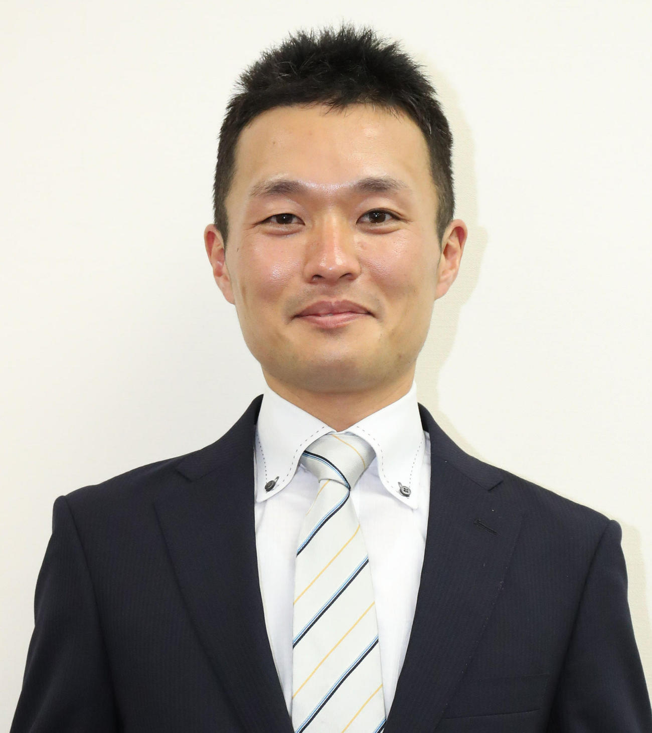 小栗実調教師（2021年12月9日撮影）