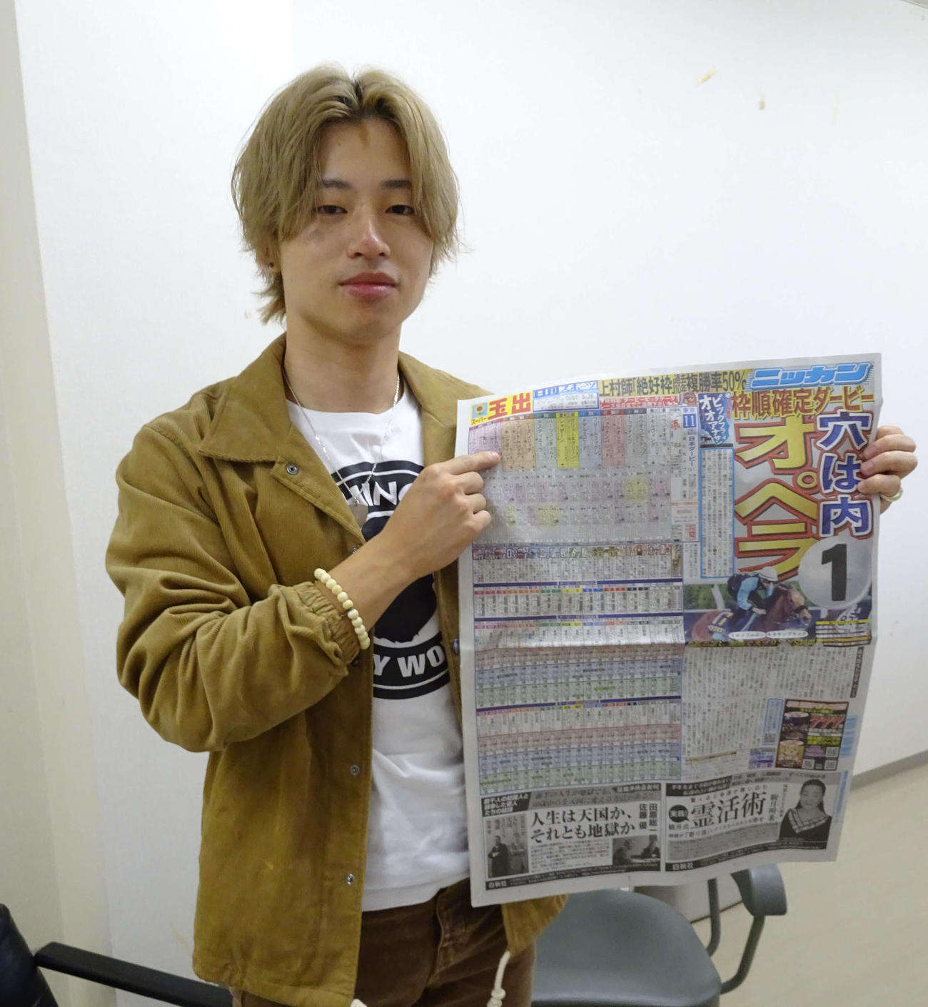 本命馬を指さす山口拳矢