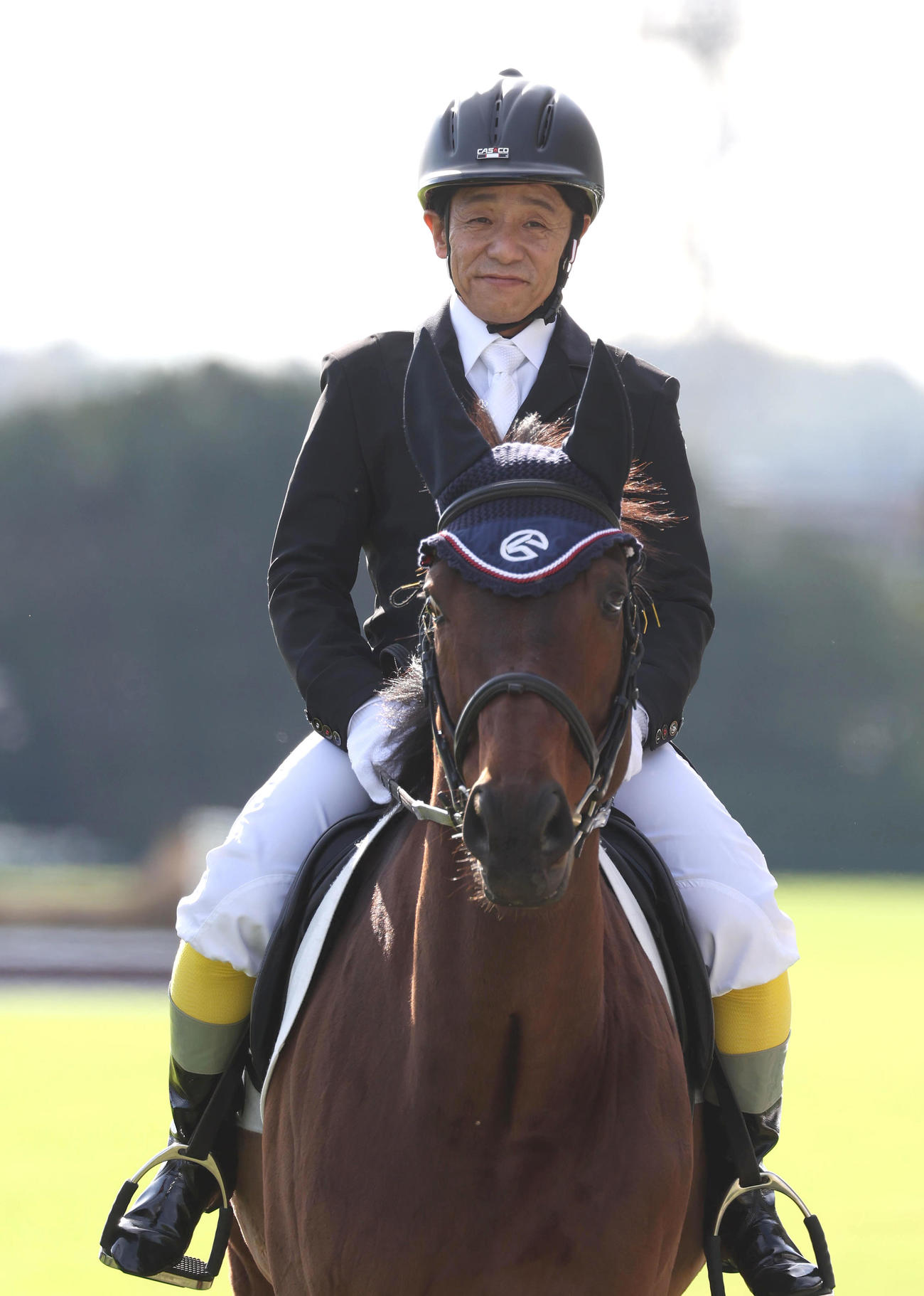 誘導馬に騎乗して京都ジャンプSの誘導をした熊沢騎手（撮影・白石智彦）