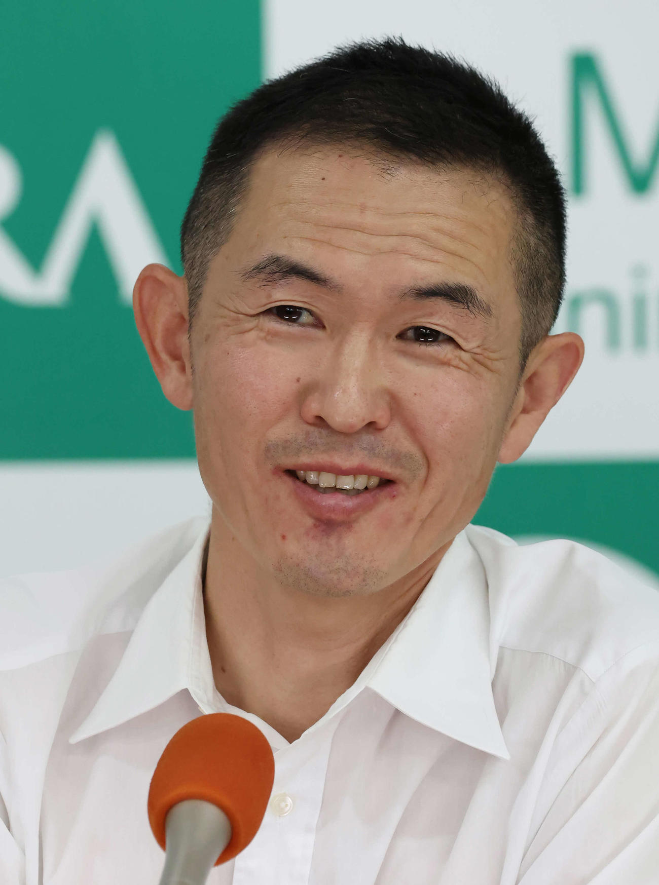 記者会見する木村師（撮影・丹羽敏通）