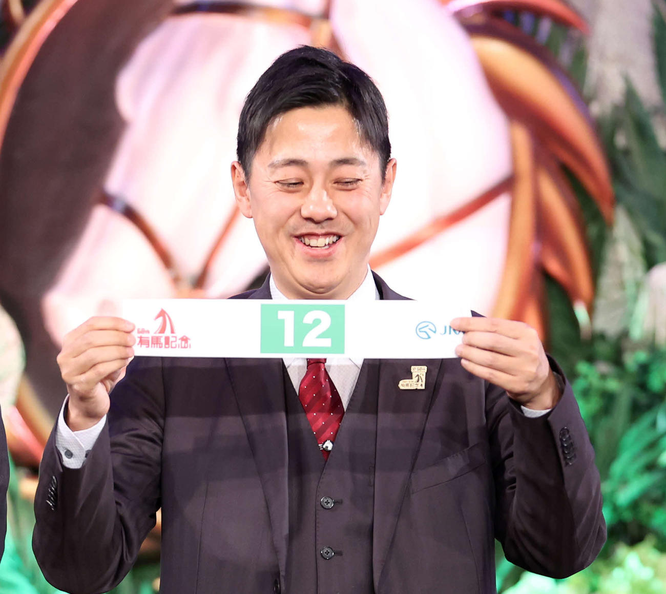 6枠12番を引いたウインマリリンの岡田義広代表（撮影・鈴木正人）