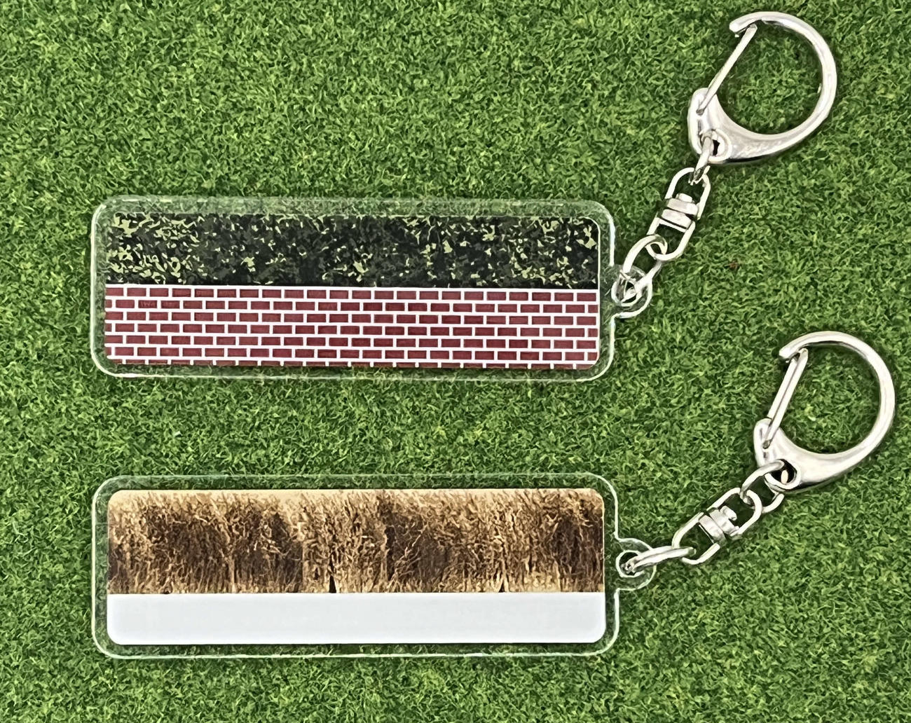 「パレードリング」が販売を開始した大竹柵と大いけ垣のキーホルダー（アクリルバージョン）