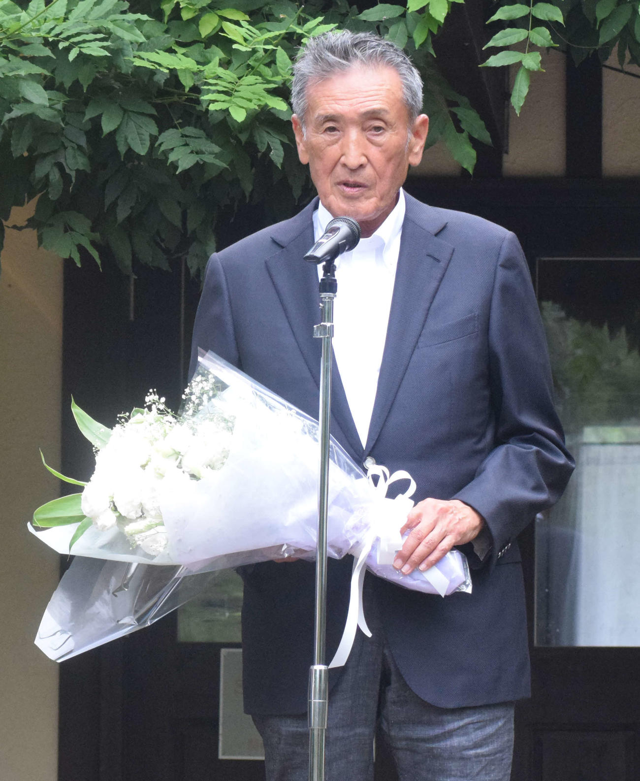 リバティアイランドの墓碑設置記念セレモニーで登壇する吉田勝己氏