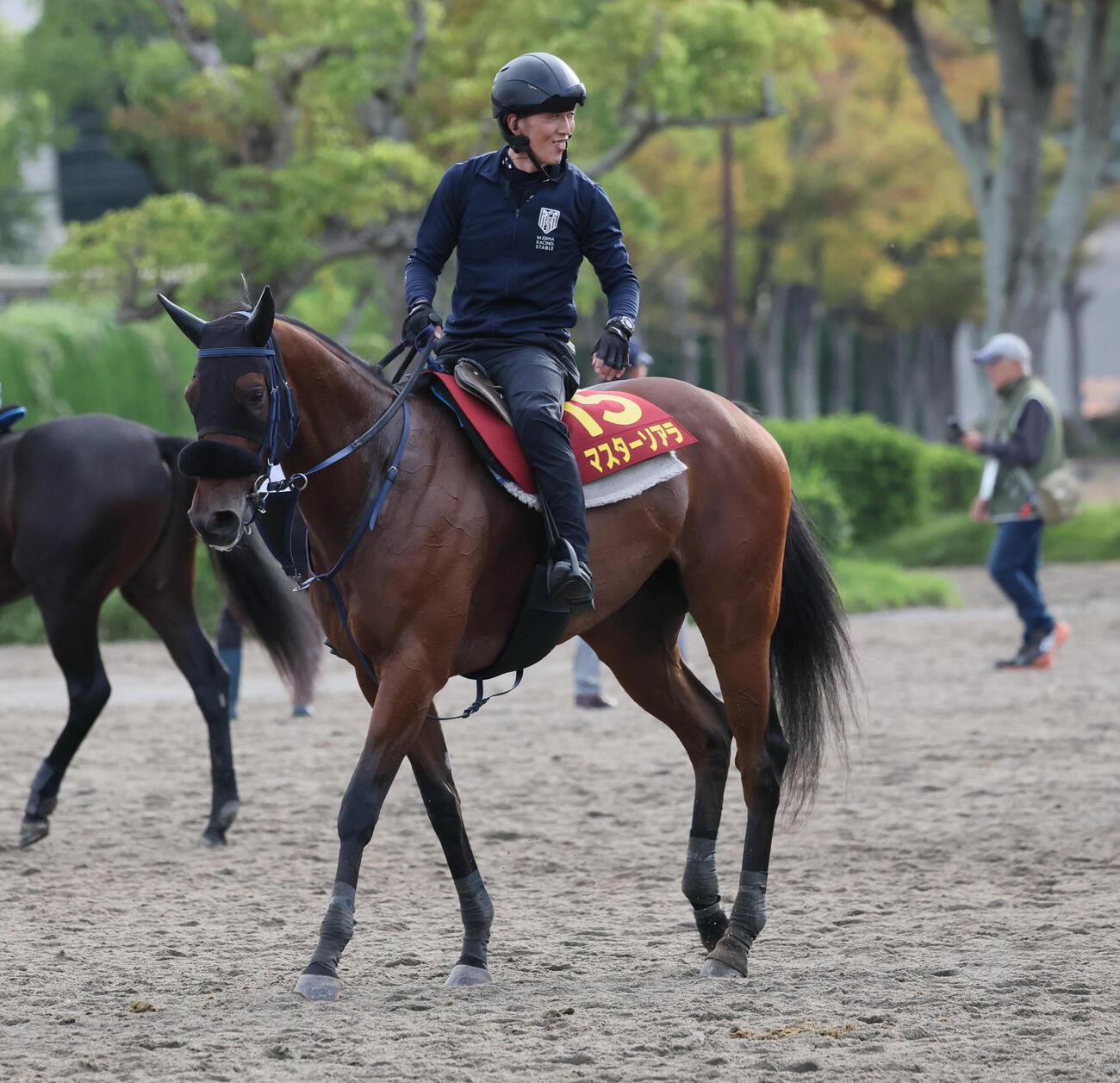 追い切りを終えて馬場を出るマスターソアラ（撮影・丹羽敏通）