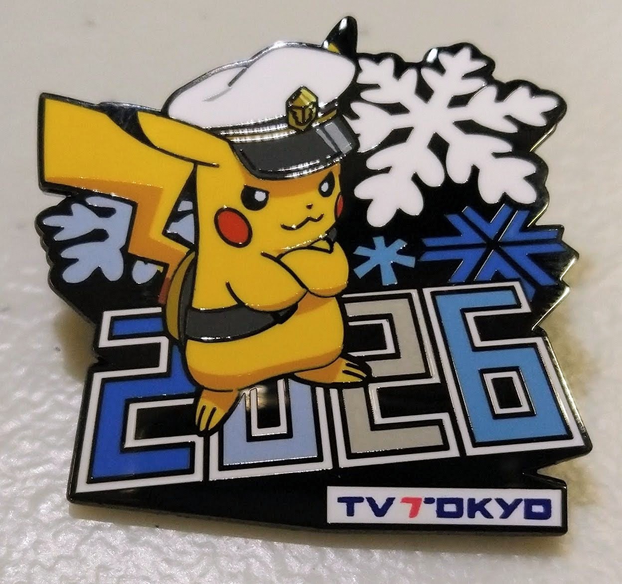 ピカチュウのデザインで不動の人気を誇るテレビ東京の2026ミラノ・コルティナ五輪ピンバッジ