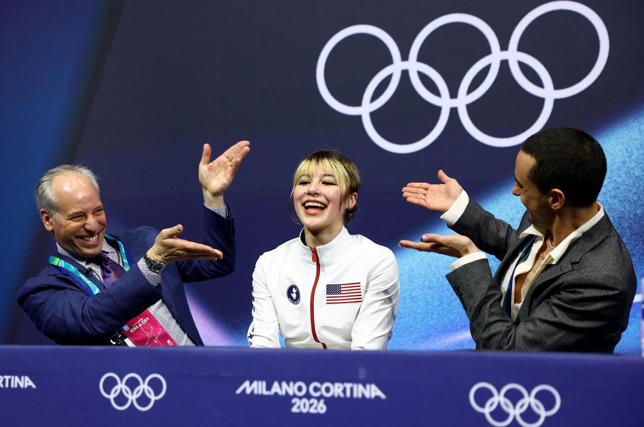 女子SP3位、アリサ・リュウは笑顔を見せる（ロイター）