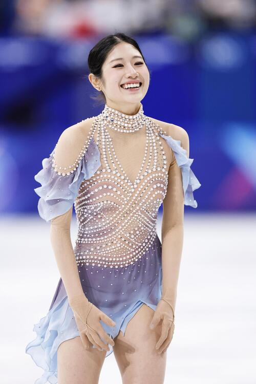 女子SPの演技を終え、笑顔の李海仁(共同)