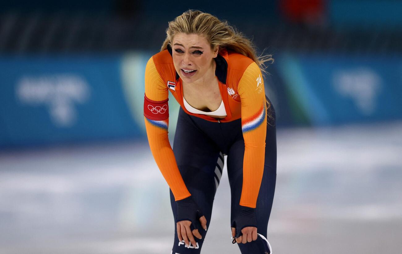 スピードスケート女子1000メートルで金メダルを獲得したユタ・レールダム。涙で化粧が落ち、目から頬が黒くなっていた（ロイター）