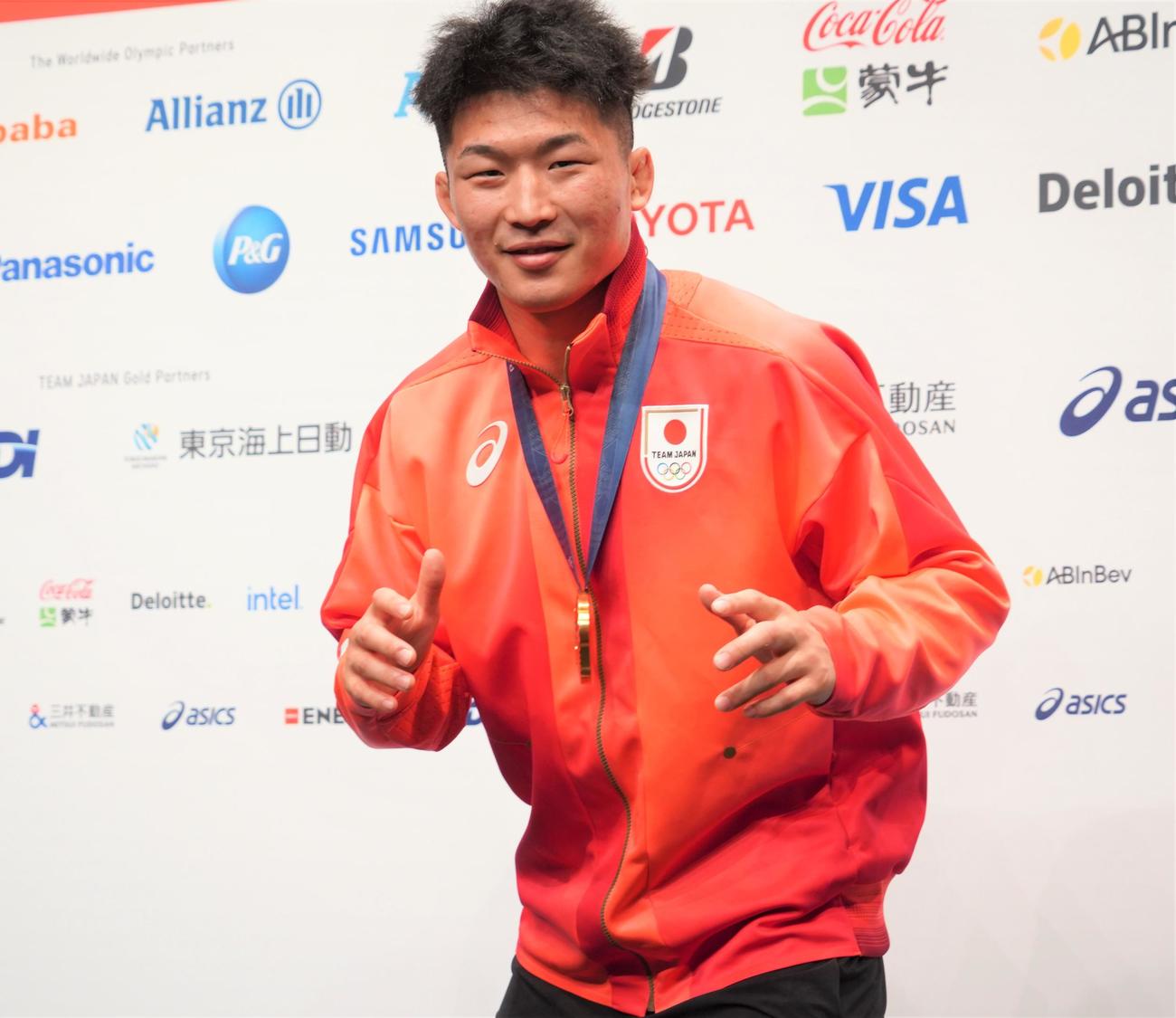 メダリスト会見に出席したレスリング男子グレコローマンスタイル77キロ級の日下尚（撮影・佐藤成）