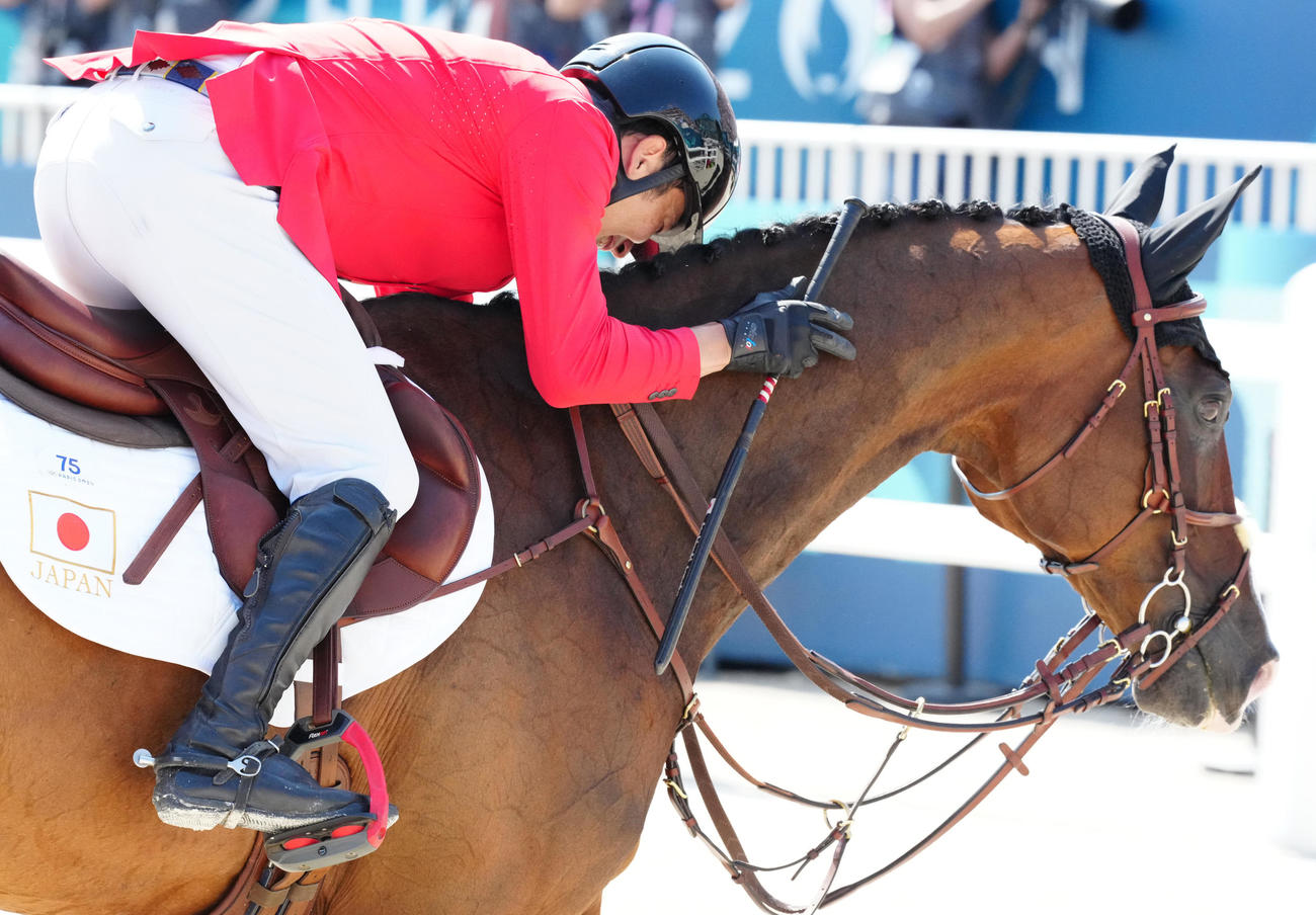 総合馬術団体の障害馬術で演技を終えた田中（撮影・江口和貴）