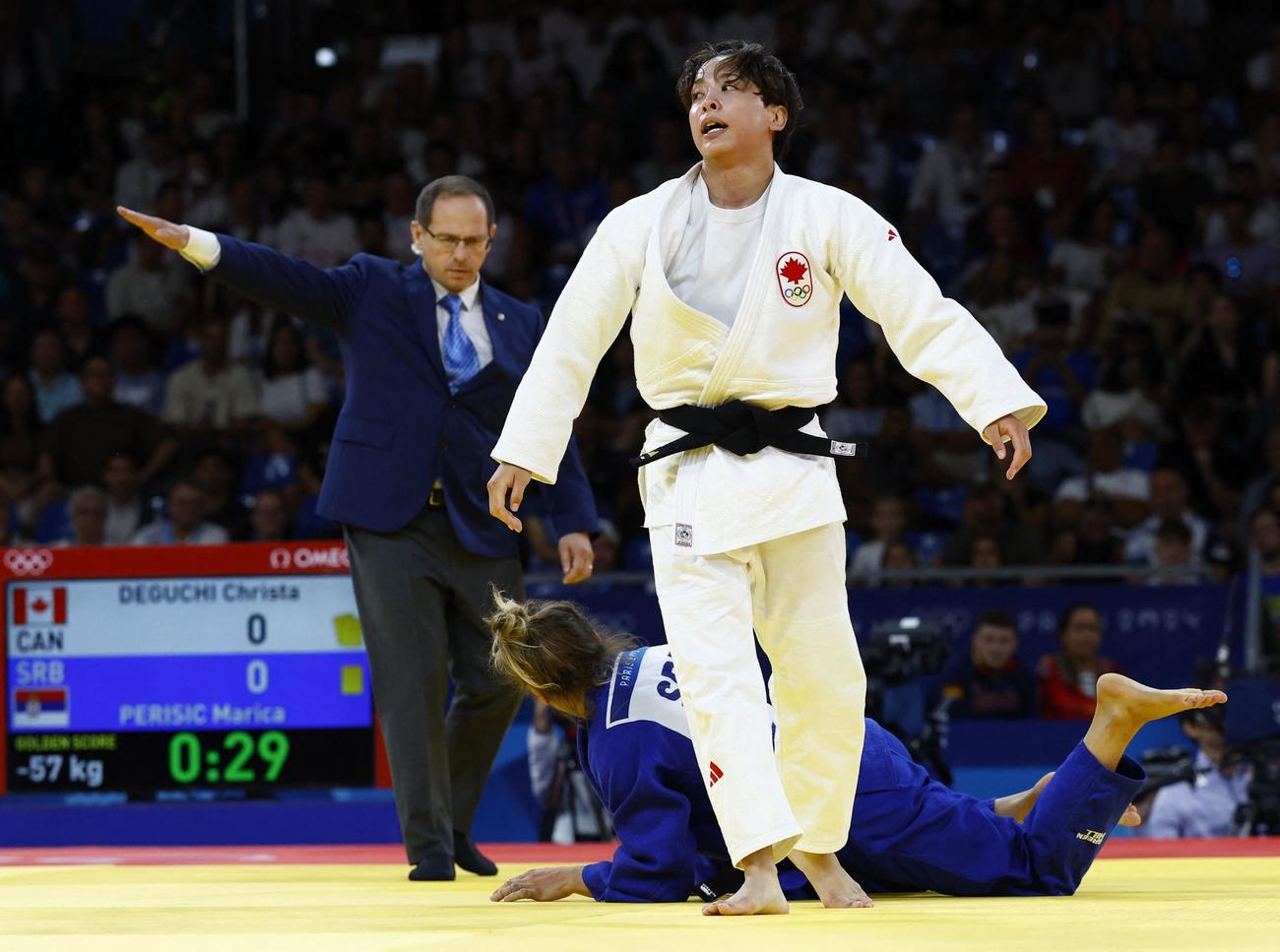 女子57キロ級準々決勝　セルビア・ペリシッチを破り準決勝進出のカナダ出口クリスタ（ロイター）