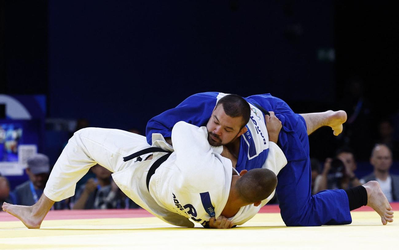 男子100キロ級1回戦　一本勝ちで初戦を突破したウルフ・アロン（ロイター）