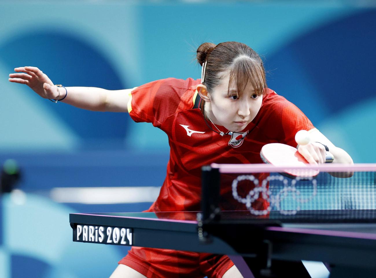 女子シングルス1回戦　イタリア選手と対戦する早田ひな（共同）
