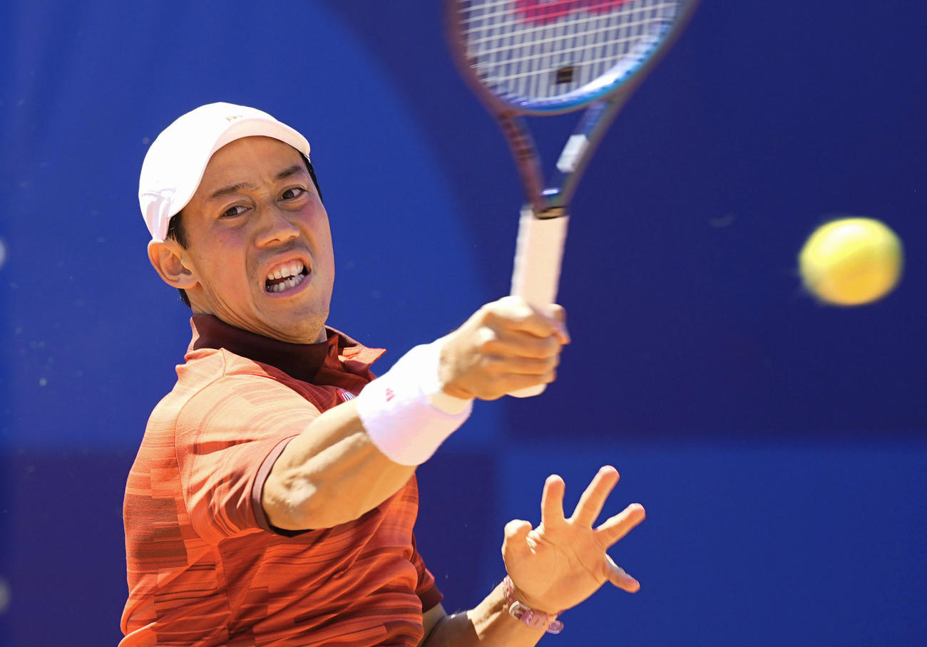 男子シングルス1回戦　プレーする錦織圭（共同）