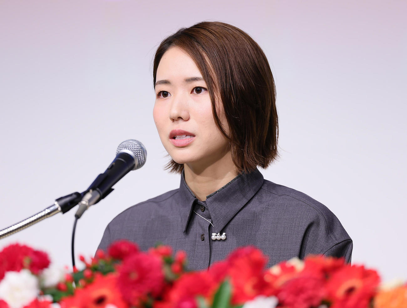 引退会見に臨む古賀（撮影・足立雅史）