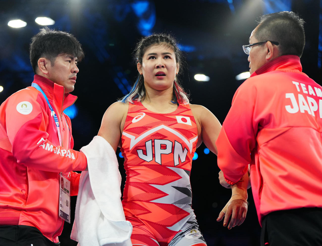 女子フリースタイル68キロ級準々決勝に臨む尾崎（中央）（撮影・江口和貴）