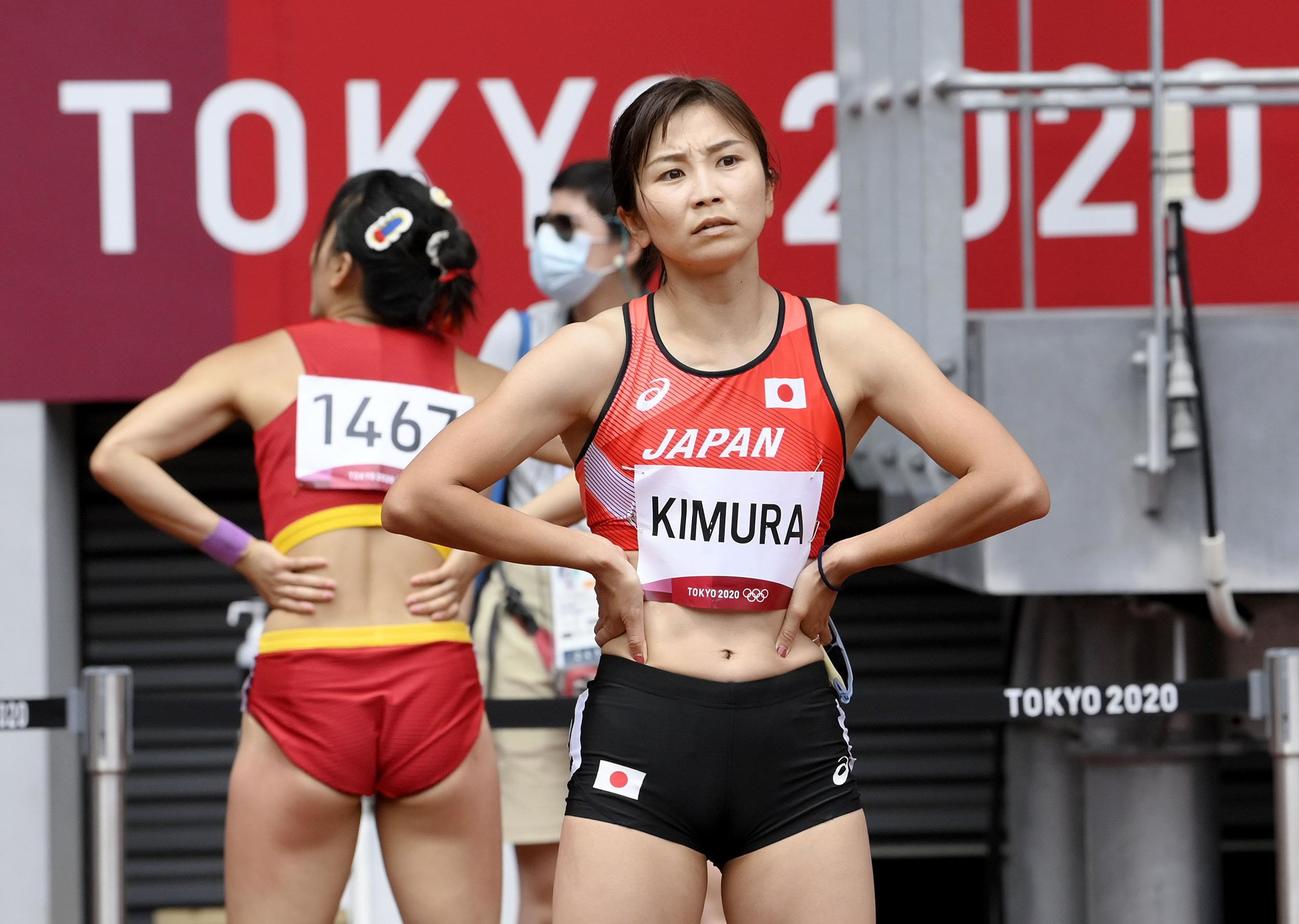 女子100メートル障害予選　ゴール後に厳しい表情を見せる木村文子（共同）