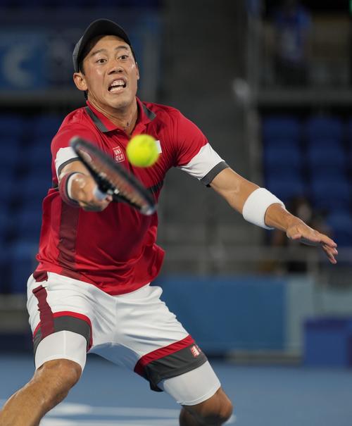 男子シングルス準々決勝　ノバク・ジョコビッチと対戦する錦織圭（共同）