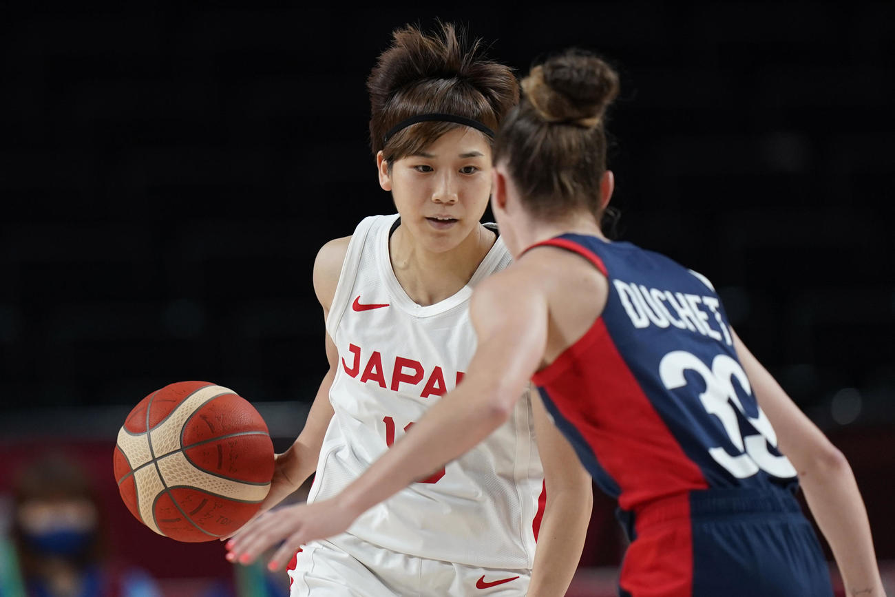ドリブルする町田（AP）