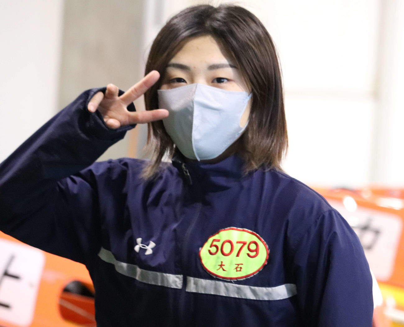 準優進出を決めた大石真央が、カメラに向かってピース