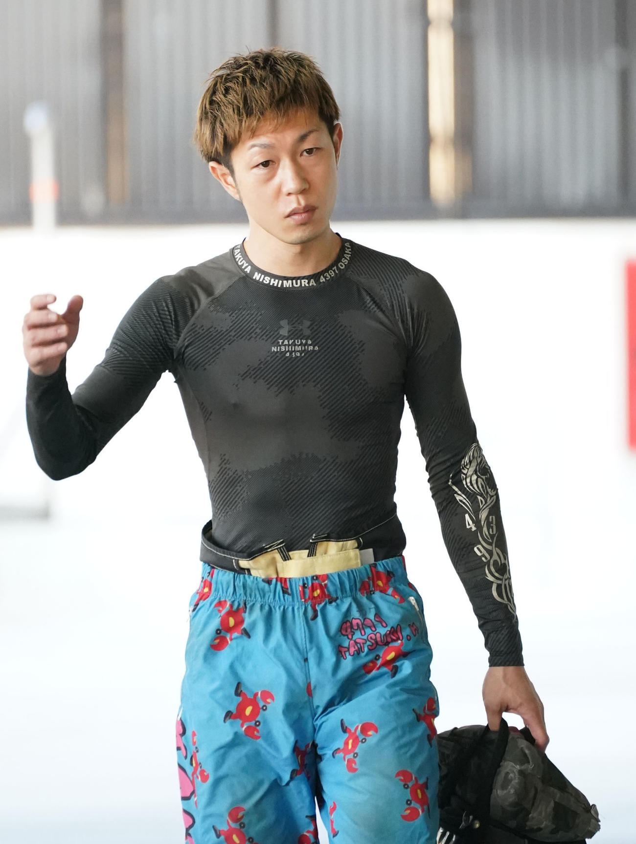 西村拓也