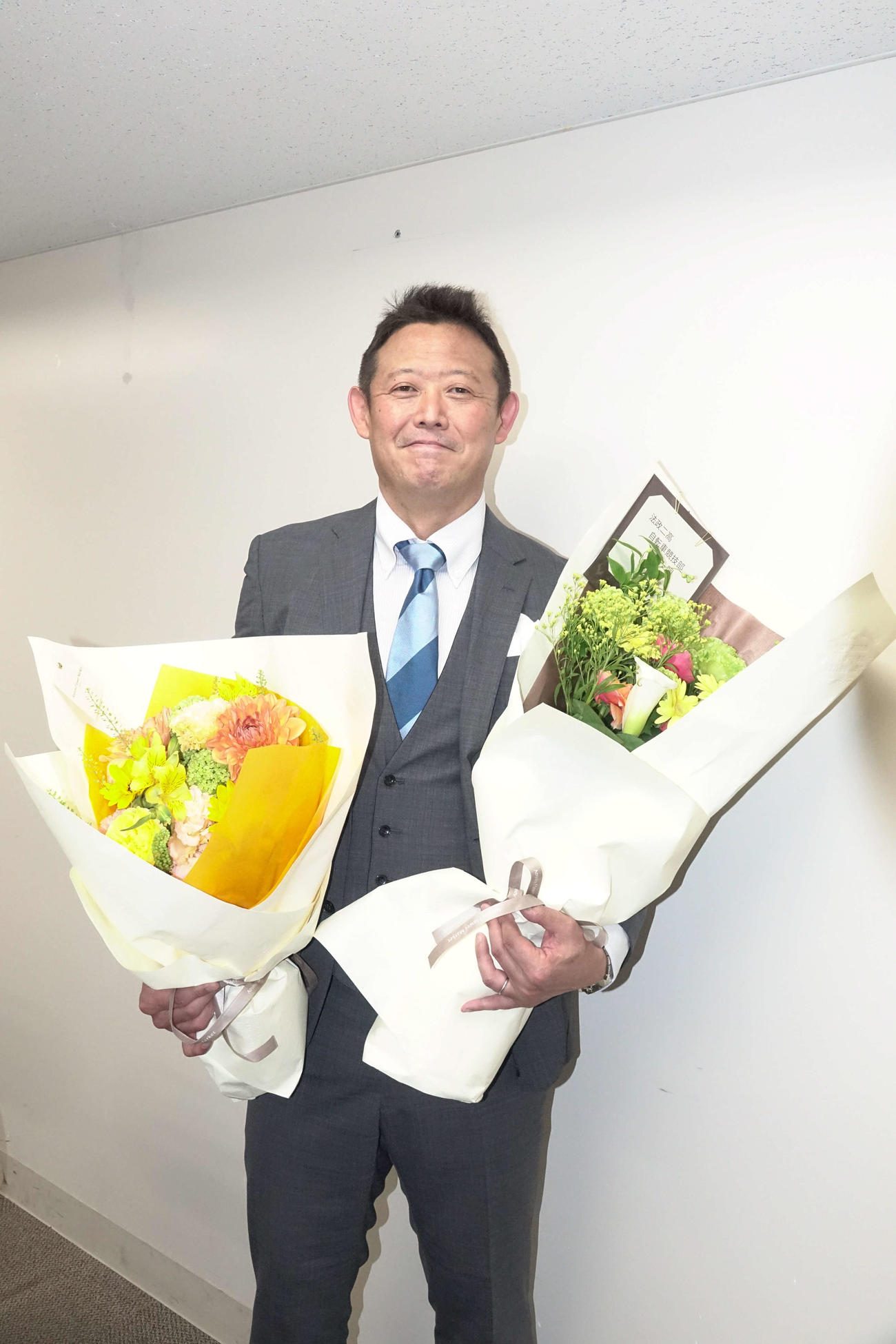 ファンの前で現役引退を表明した出口真浩