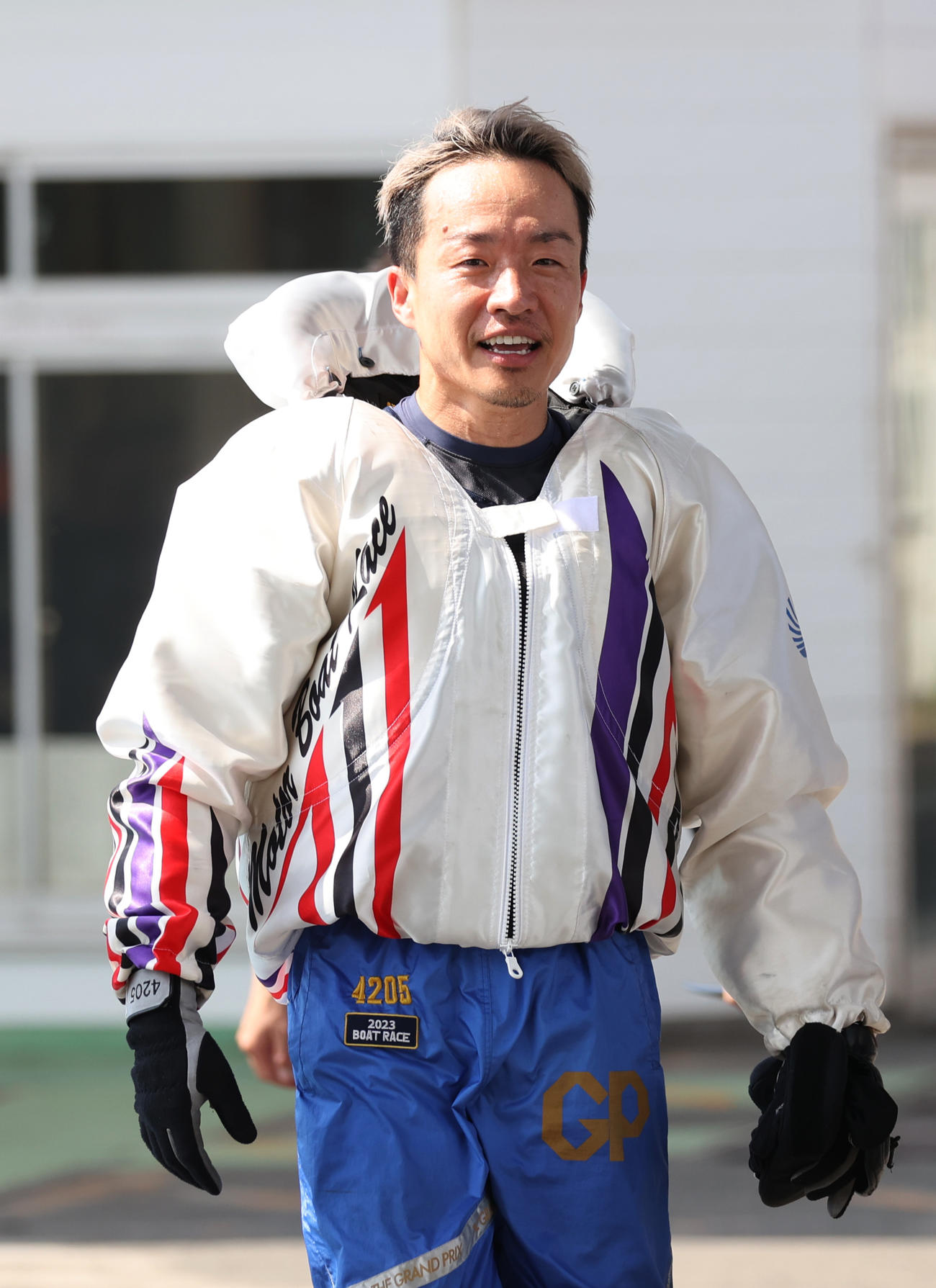 予選8Rで1500勝を達成し笑顔を見せる山口剛（撮影・柴田隆二）