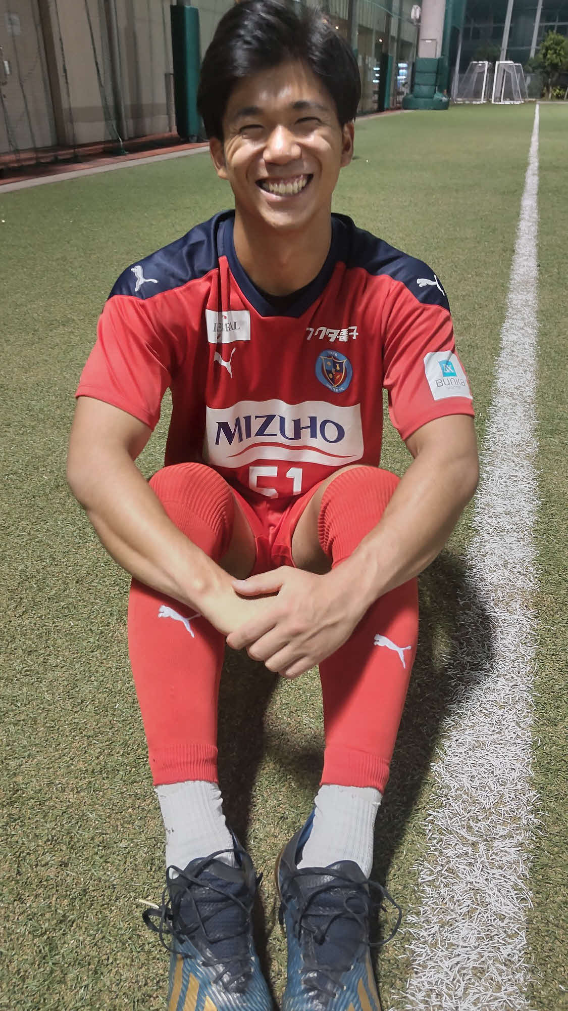 笑顔で取材に応じる上川琢選手