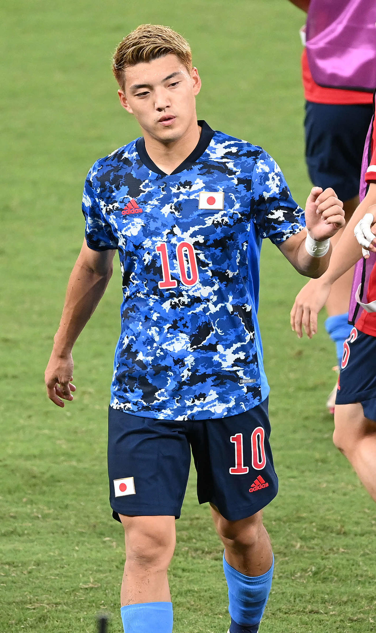 21年7月、東京五輪の南アフリカ戦でロッカーへ引き揚げる堂安