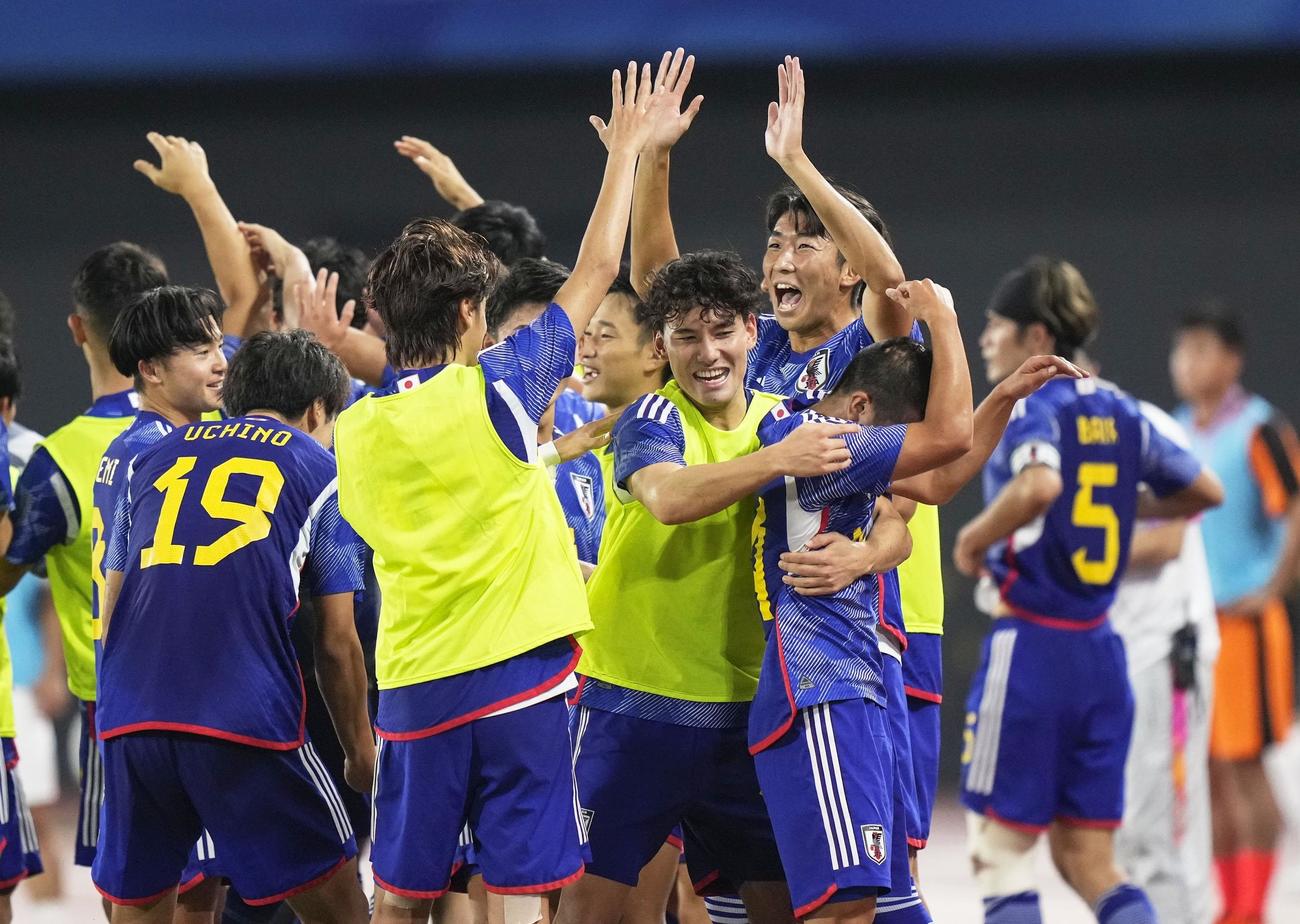 北朝鮮に勝利し喜ぶ日本イレブン＝杭州（共同）