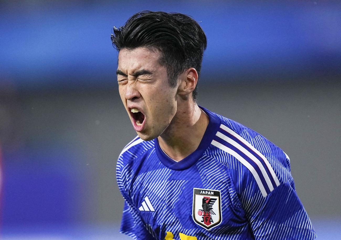 日本対香港　後半、チーム2点目のゴールを決め、叫ぶ日野（共同）