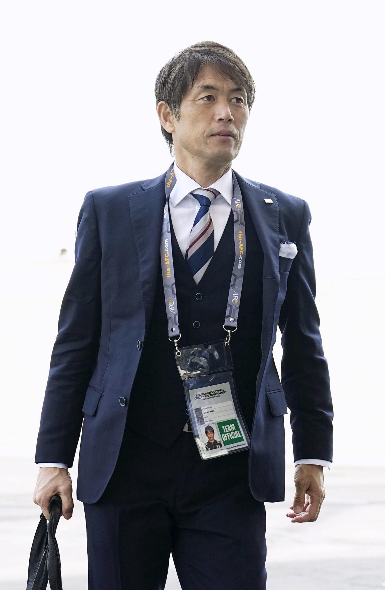 北朝鮮戦の試合会場に到着した池田監督（共同）