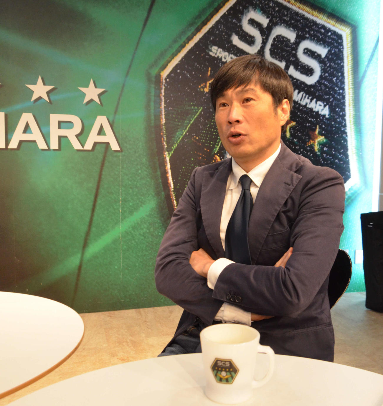 チームについて語るJ3相模原の望月会長　