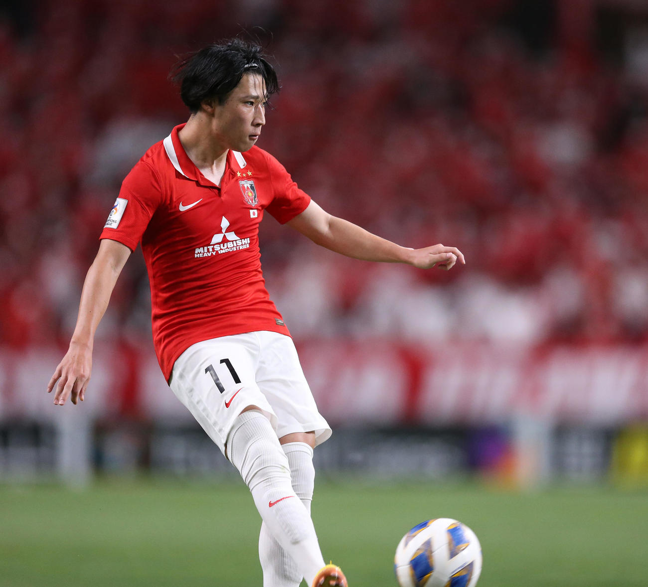 ACLジョホール対浦和　前半、クロスを上げる浦和松尾（撮影・宮地輝）