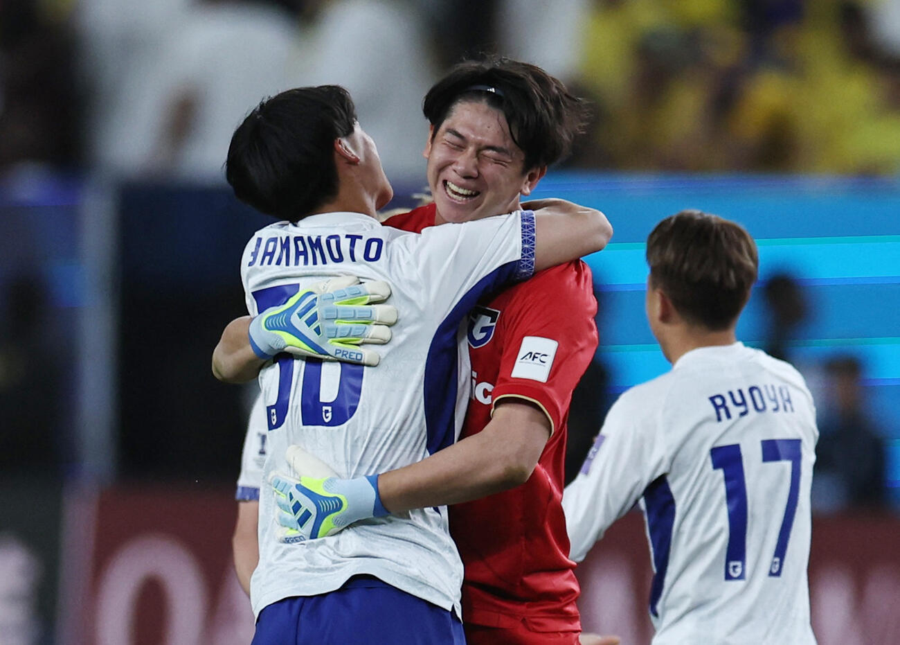 ACL2を制し、喜びを分かち合うG大阪の選手たち（ロイター）