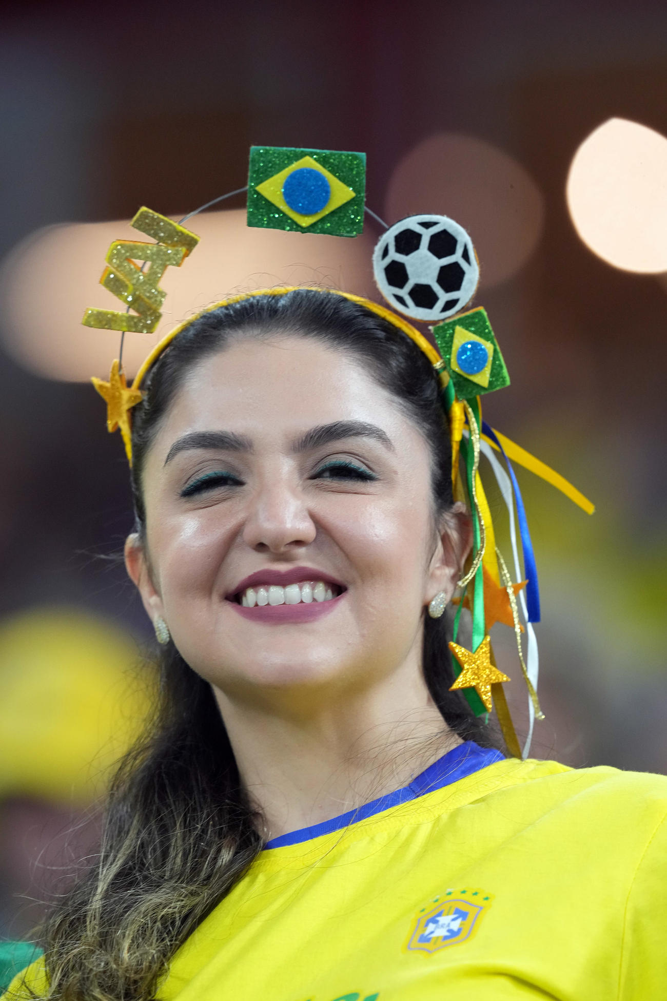 ブラジル対スイス　笑顔で応援するブラジルサポーター（撮影・パオロ　ヌッチ）