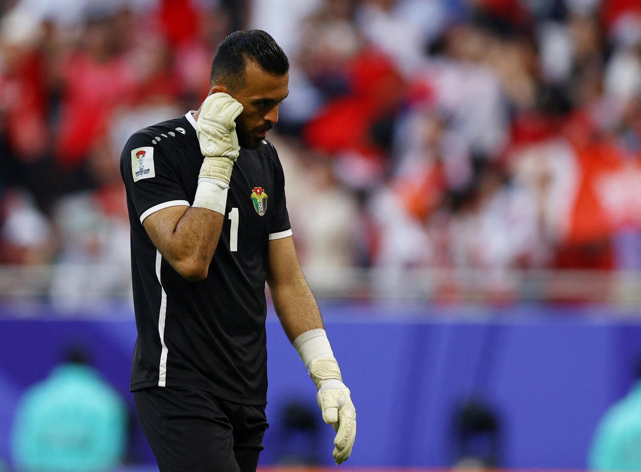 韓国代表に同点に追いつかれ悔しそうな表情のヨルダン代表ヤジド・アブ・レイラ（ロイター）