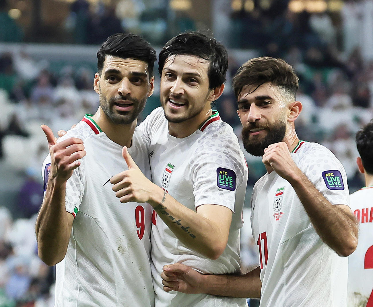 イラン対UAE　前半、ゴールを決め喜ぶイランのタレミ（左）（撮影・足立雅史）