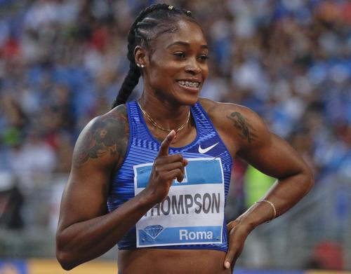 女子100メートルで優勝したトンプソン（AP）
