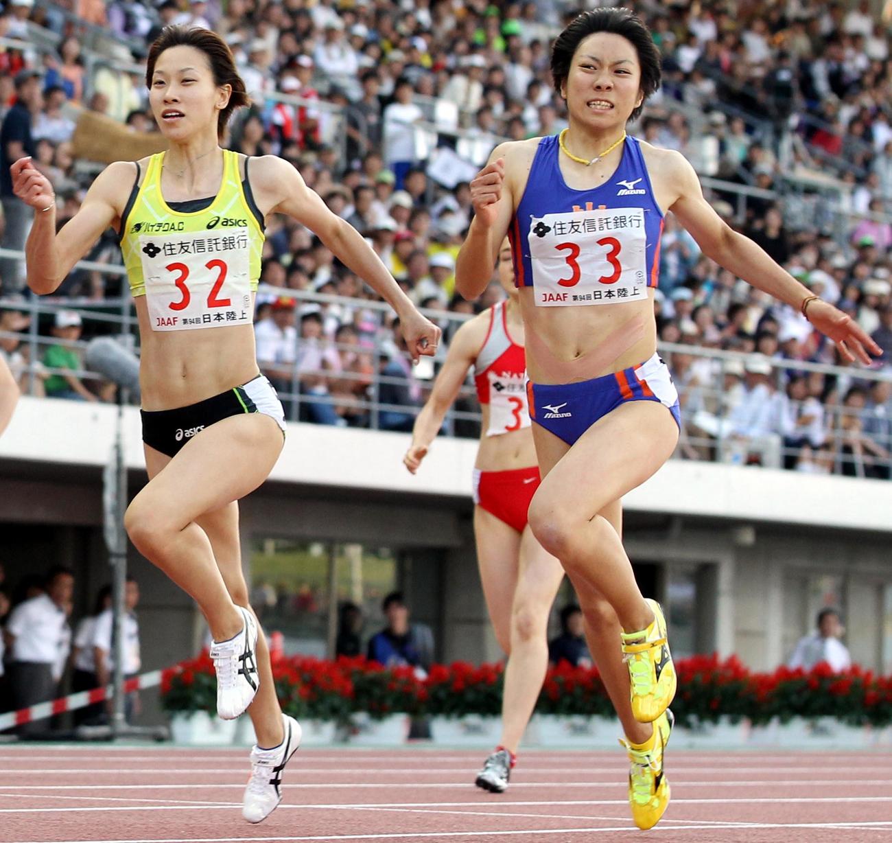 2010年6月6日、日本選手権女子200メートル決勝　23秒56で優勝した高橋萌木子。左は2位の福島千里