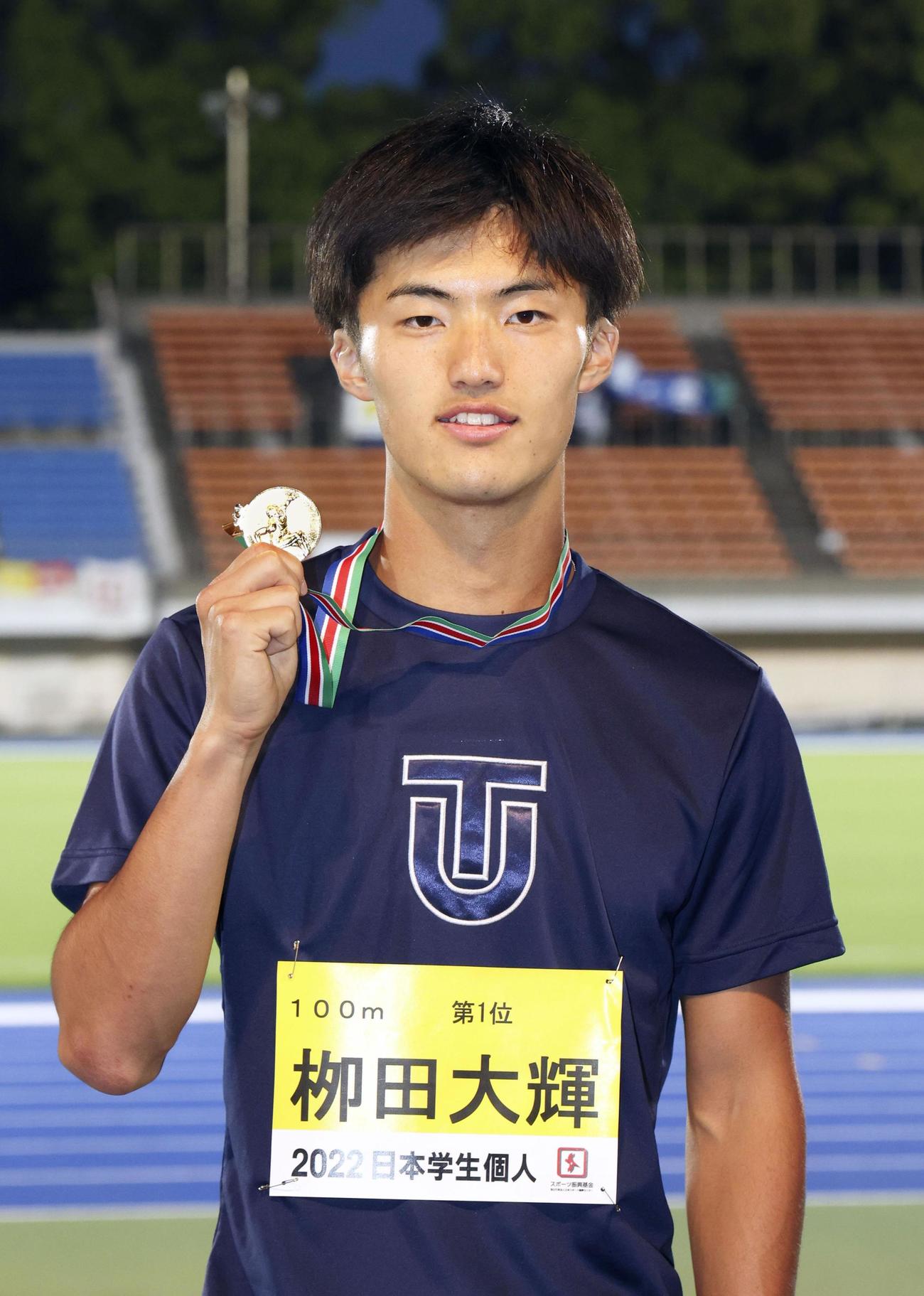 男子100 メートル で優勝した柳田大輝（共同）