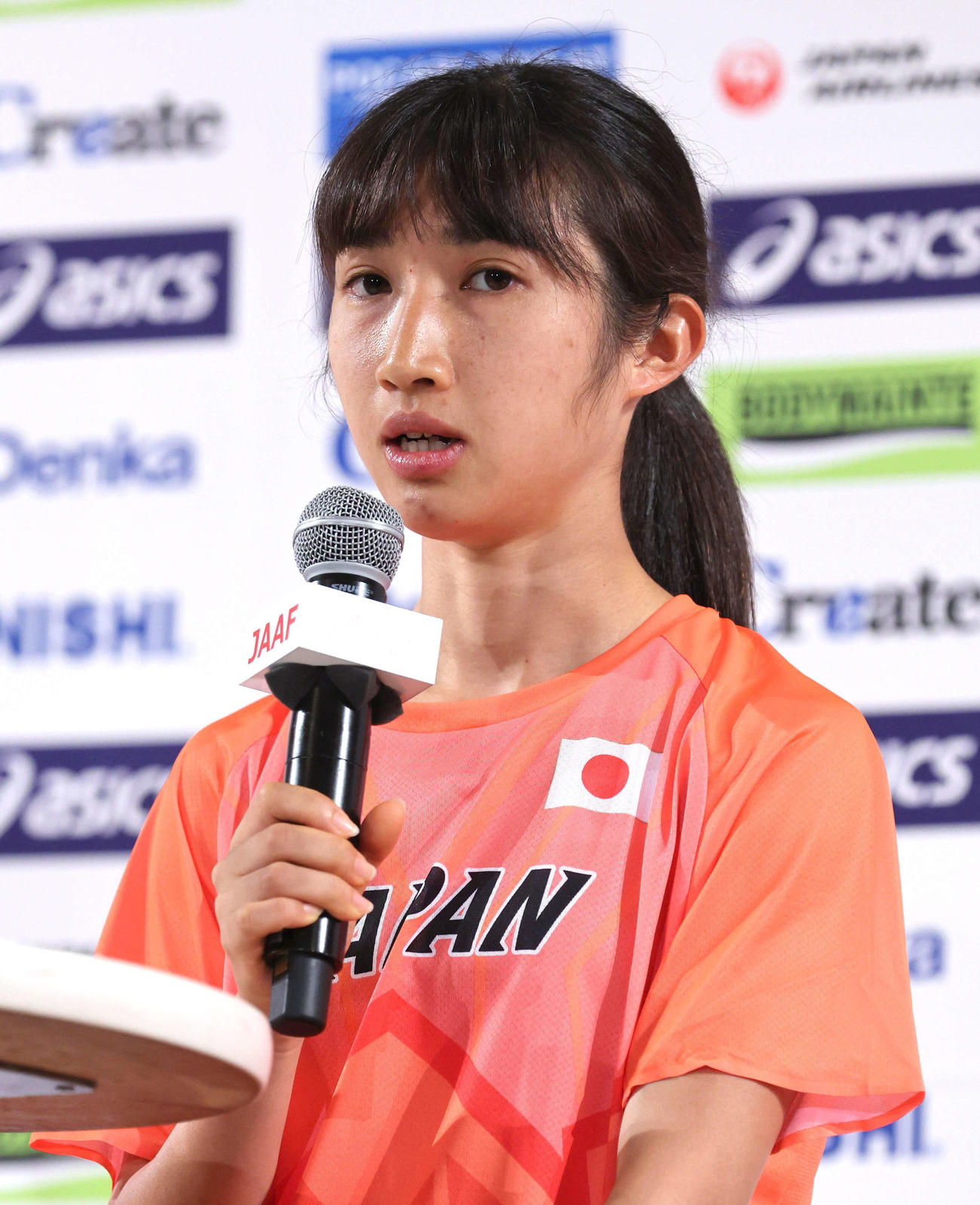 6月13日、記者会見で世界陸上への思いを語る田中（代表撮影）