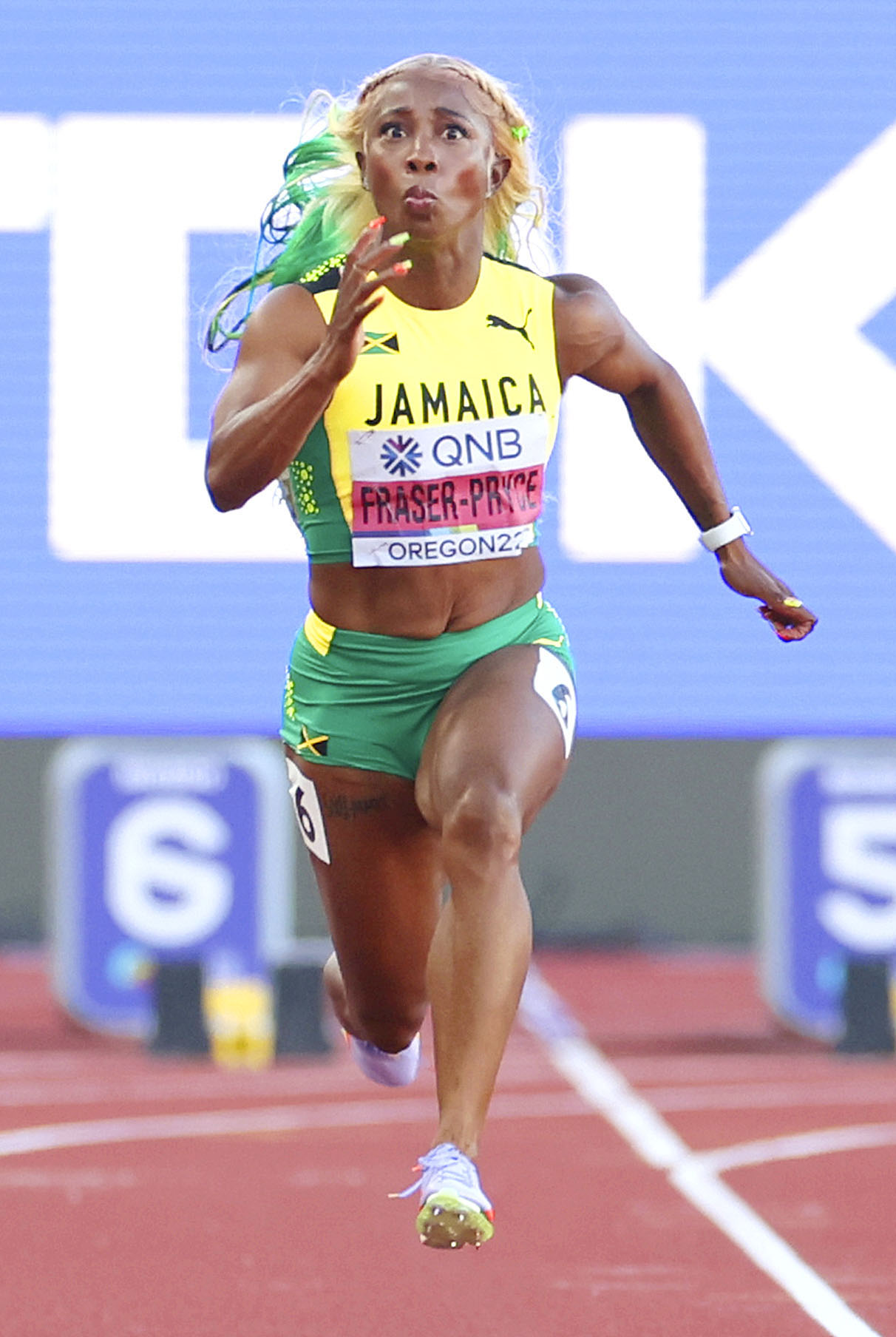 女子100 メートル 決勝で力走するジャマイカのシェリーアン・フレーザープライス＝ユージン（代表撮影・共同）