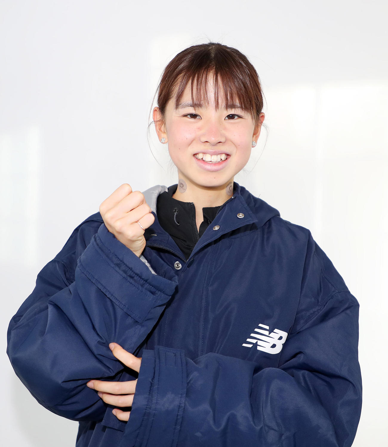 第5区を走り終えガッツポーズする拓大・不破（撮影・鈴木正人）