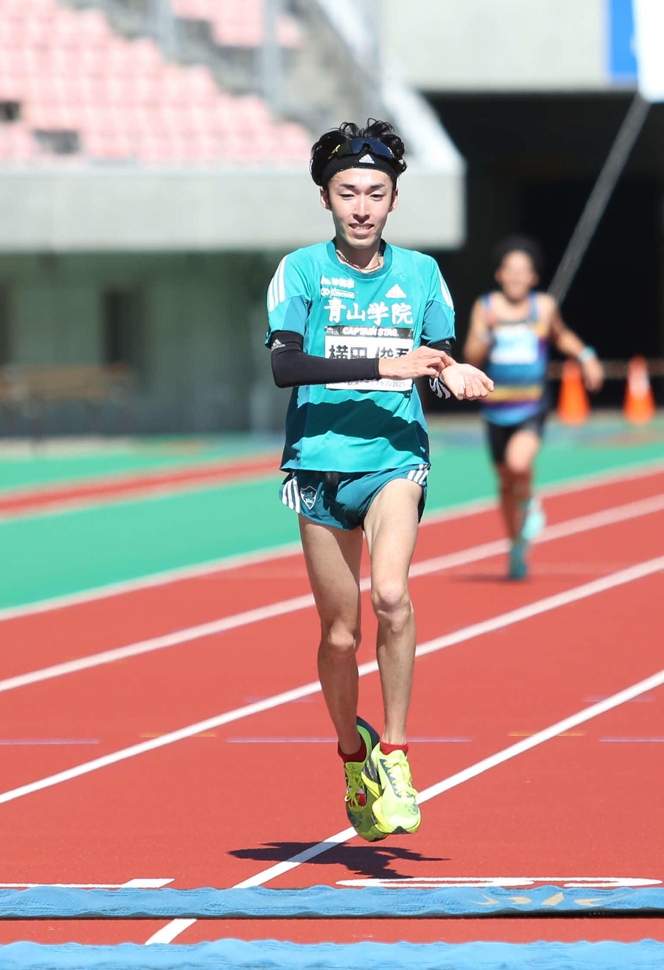 25位でゴールする横田