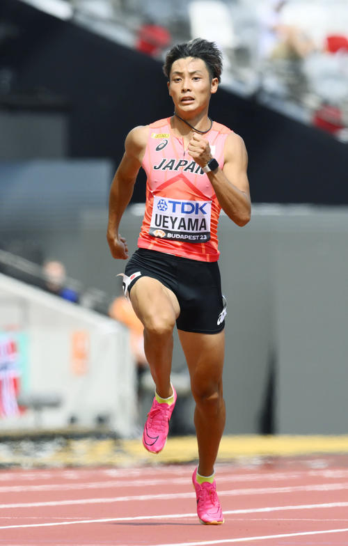 男子200メートル予選、力走する上山紘輝（共同）